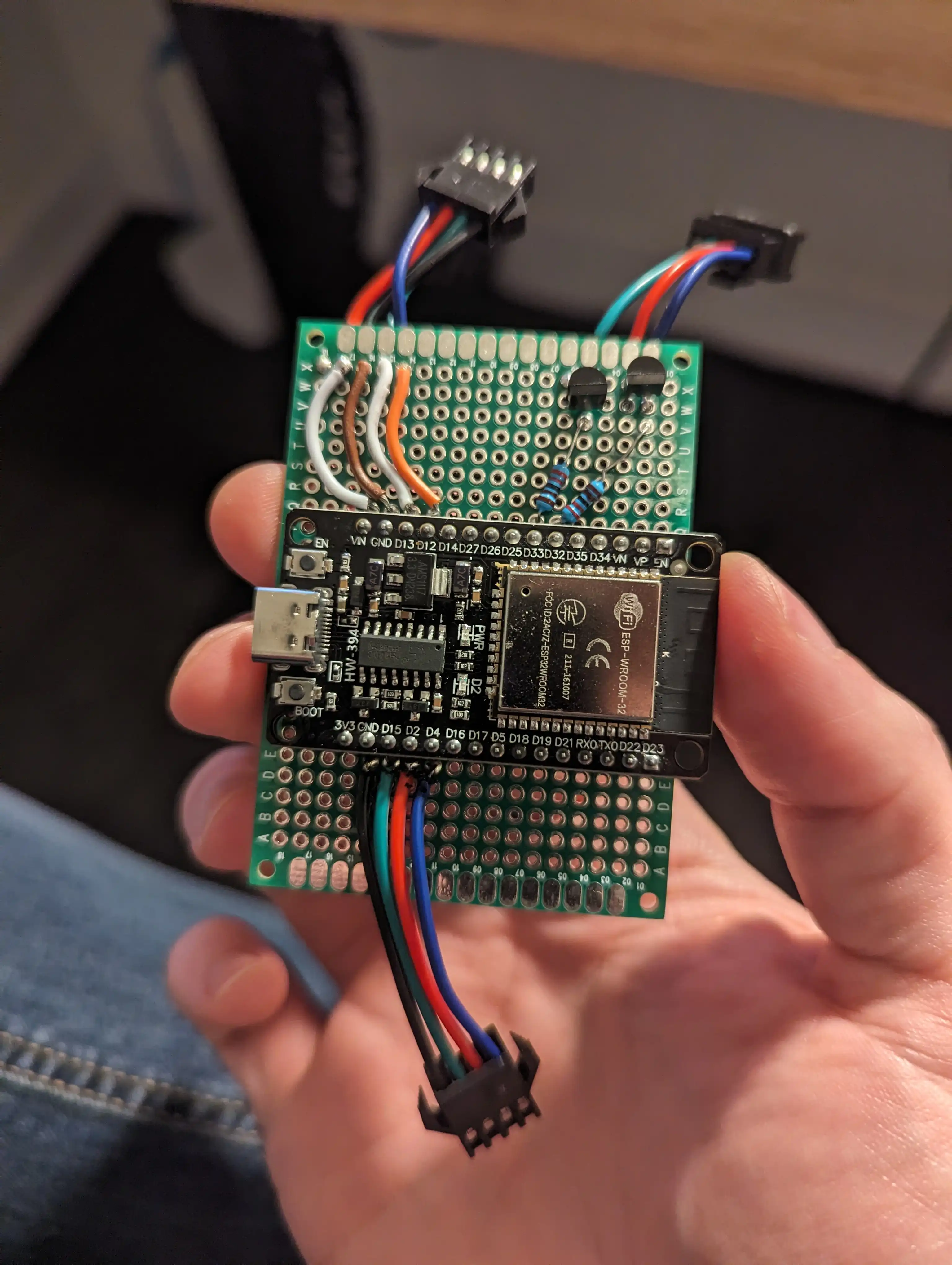 A photo of the front of a protoboard with the same wiring as the breadboard