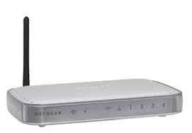 A photo of a white Netgear DG834GT router